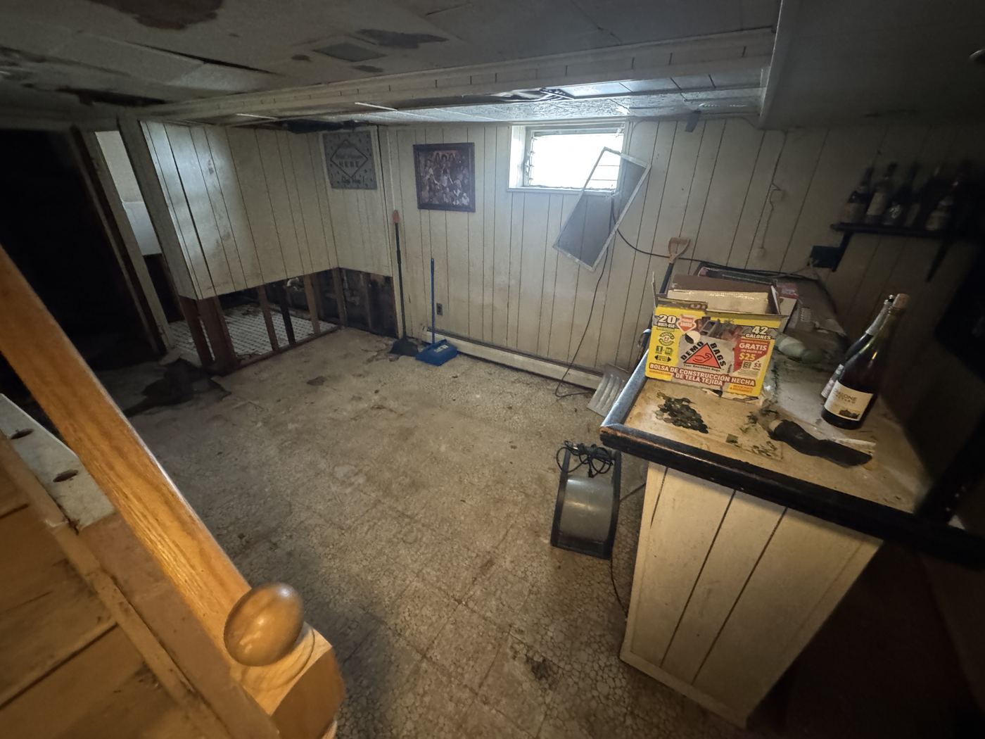 Finished basement after water intrusion with flood-cut paneling